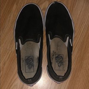 Black and white slip on vans